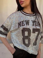 T-shirt a maniche corte con paillettes