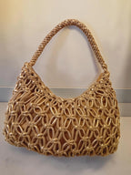 Borsa intrecciata con fili oro