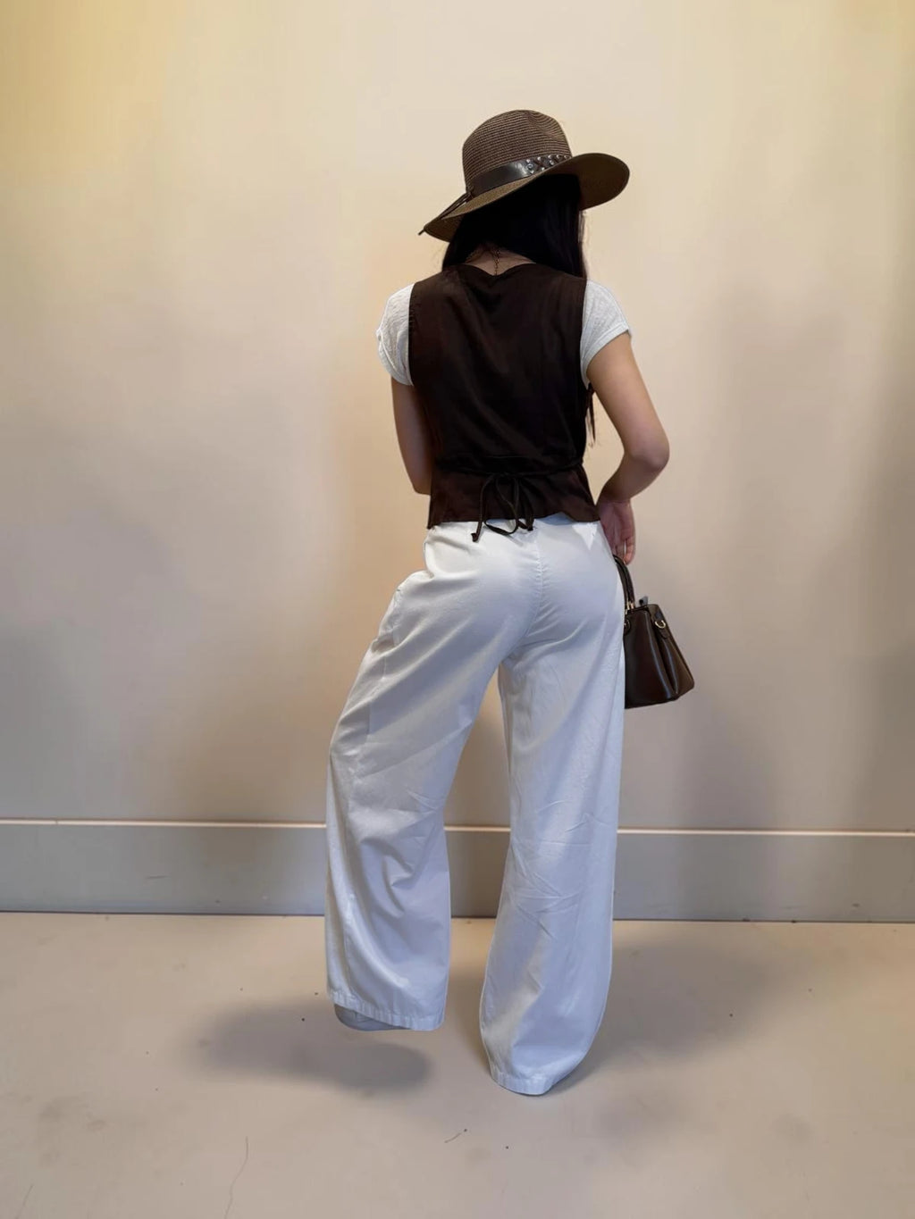 Panciotto misto lino con bottoni per creare look versatili
