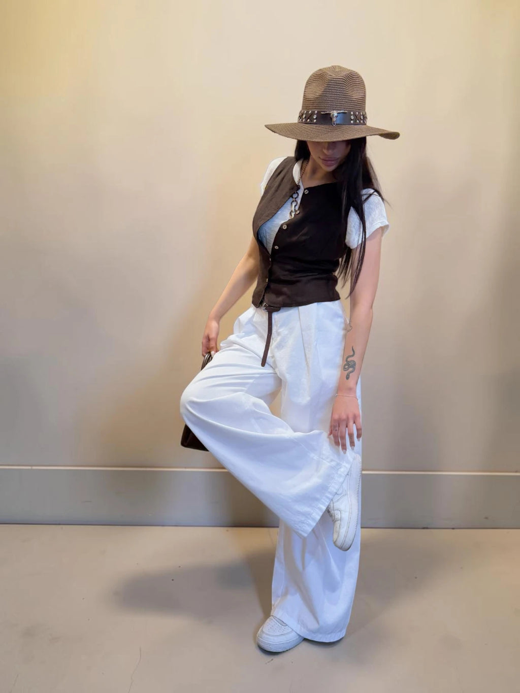 Panciotto misto lino con bottoni per creare look versatili
