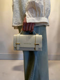 Mini bag con dettagli e catenina oro