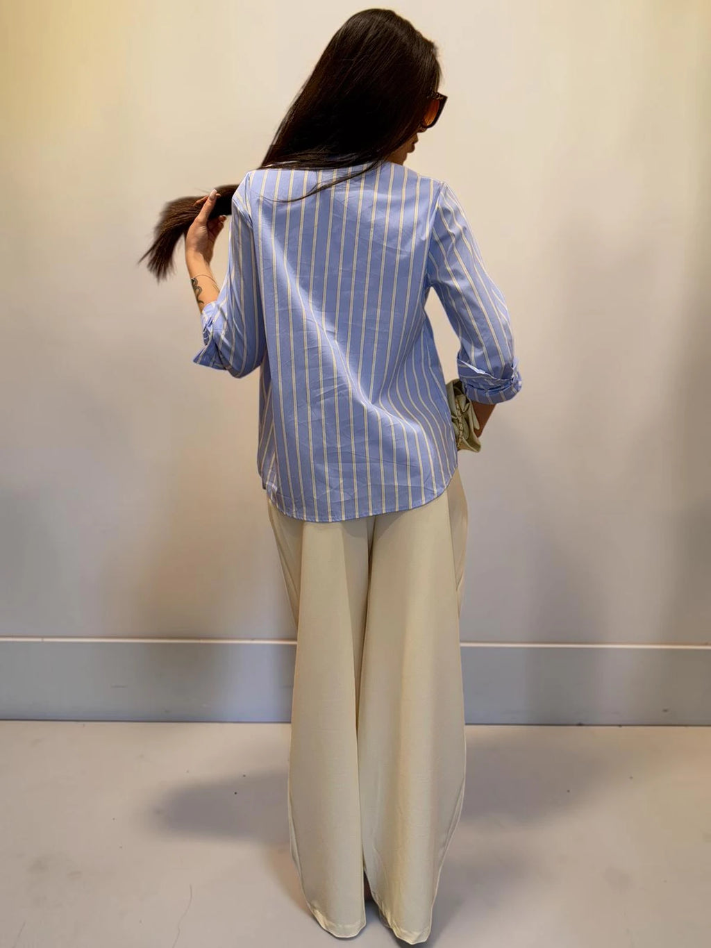 Pantalone palazzo in tessuto con pinces