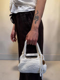 Borsa crochet con ciondolo dorato e catenina