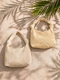 Borsa a spalla modello hobo in pizzo sangallo