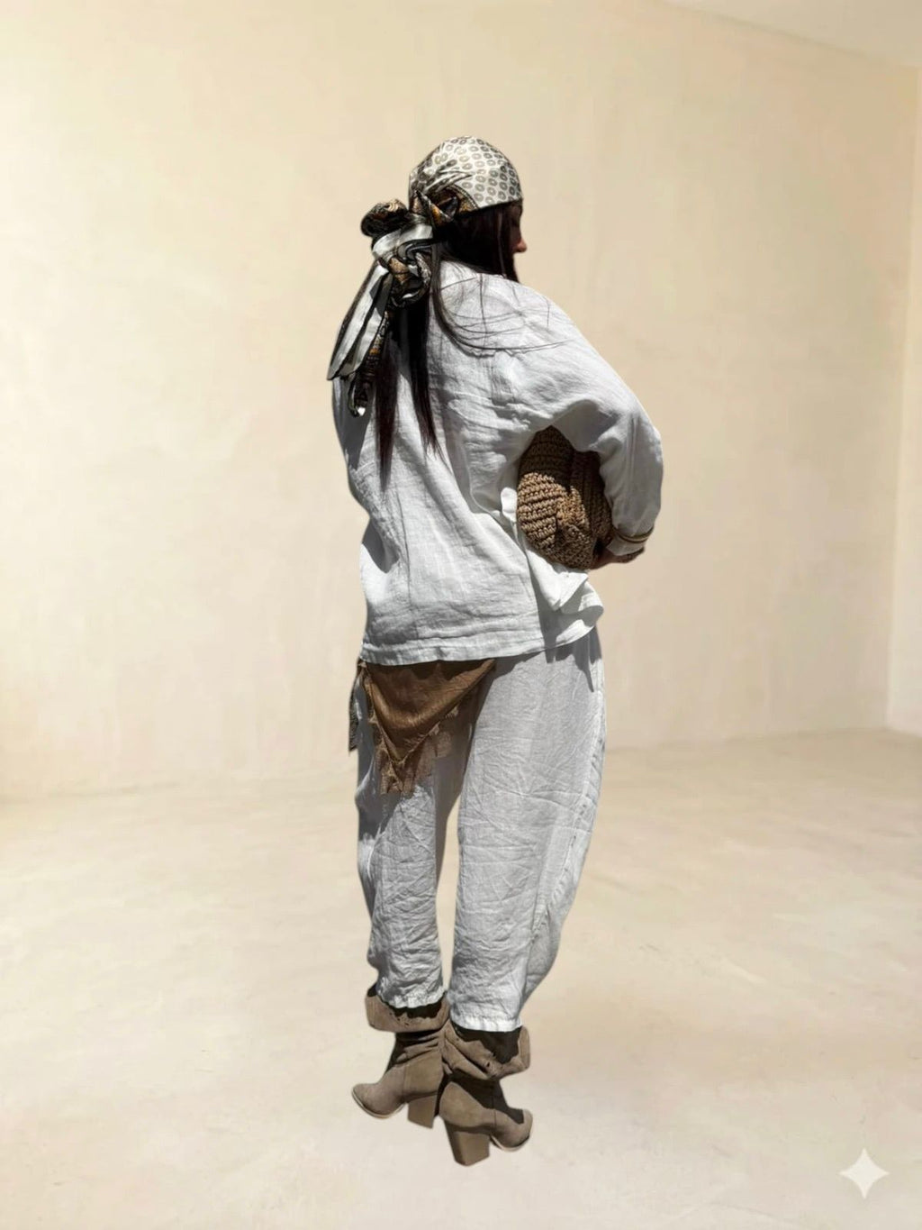 Pantalone con piegone avanti in lino