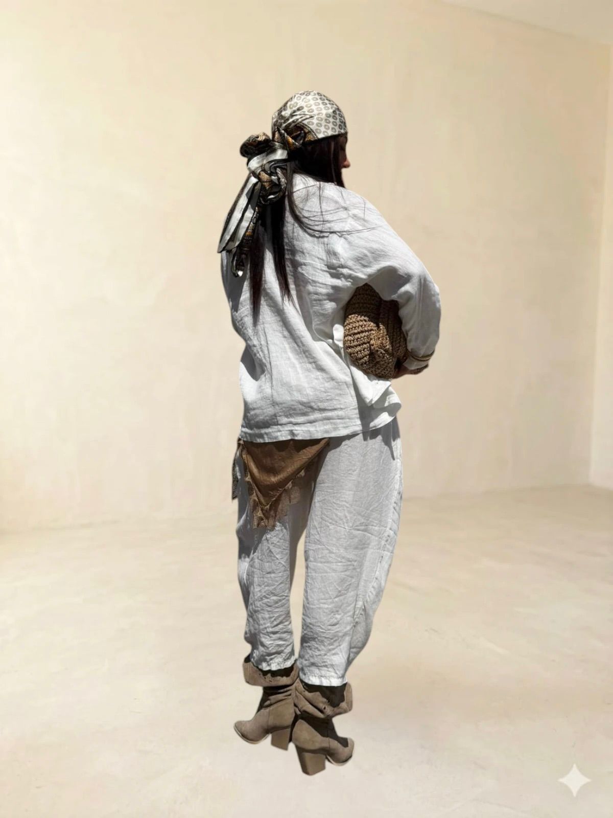 Pantalone con piegone avanti in lino