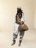 Pantalone con piegone avanti in lino