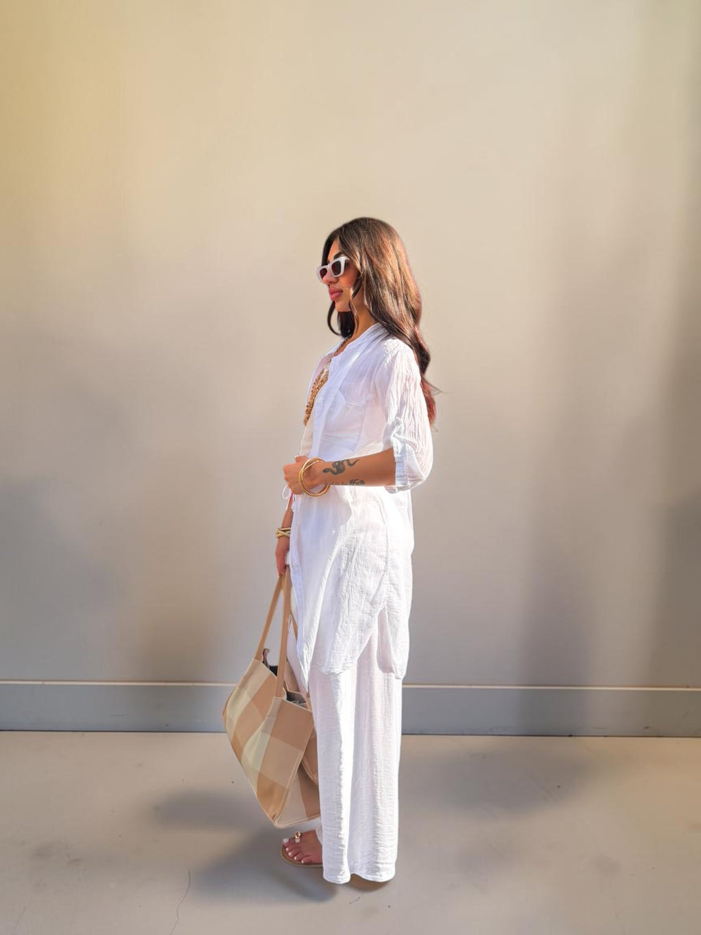 Pantalone palazzo con piegone avanti