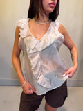 Camicia smanicata semivelata con volant
